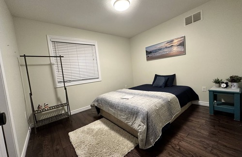 Grand River South Casa | Nice home with cozy living room, large backyard, bedroom and bathroom.