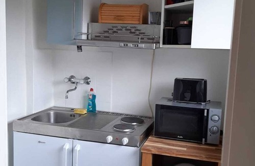 Rungsdorf Apartamento | Bonito estudio con balcón, ubicación céntrica.