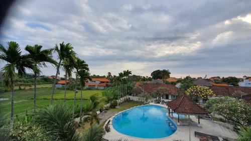 Batubelig Complejo | Nipuri Resort and Villas Seminyak by Kamara