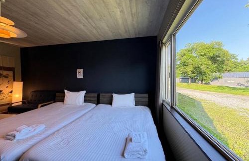Niseko Apartamento | NISEKO VILLA kiraku HOU 車利用にオススメ 各スキー場迄車で約15分