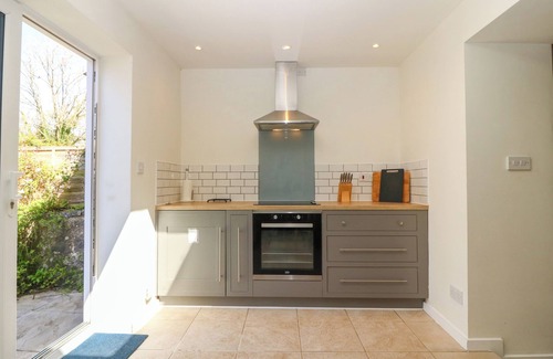Penmon Cabaña | NO.2 COEDWIG TERRACE, pet friendly, with open fire in Penmon