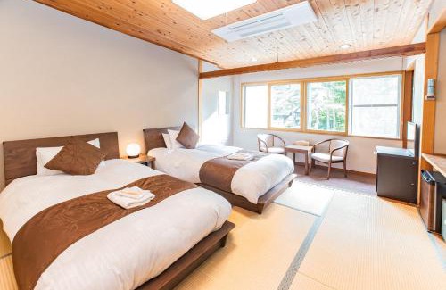 Echo Land Cama Y Desayuno | Nomad Hakuba