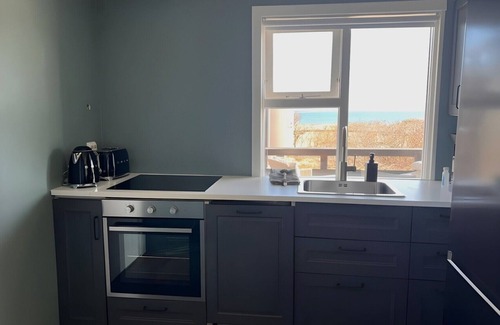 Arnarstapi Cabina | Nonholl cabin, unique getaway in Iceland