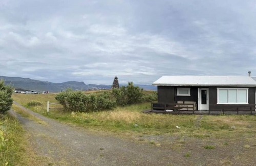 Arnarstapi Cabina | Nonholl cabin, unique getaway in Iceland