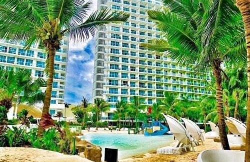 Santa Cruz Hotel | Nordic Inspired Corner Unit in Azure Urban Resort 1700 Residences