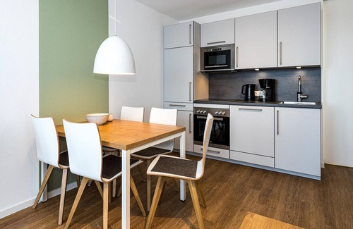 Bensersiel Apartamento | Nordseenahes Ferienapartment mit Balkonen, Parkplatz, Schwimmbad- & Saunanutzung