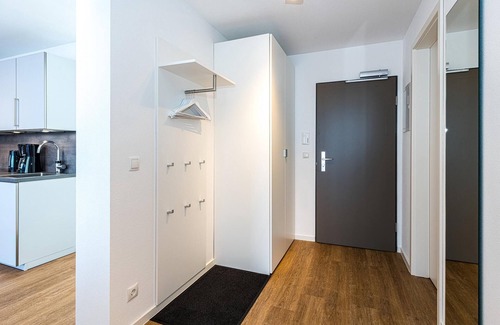 Bensersiel Apartamento | Nordseenahes Ferienapartment mit Balkonen, Parkplatz, Schwimmbad- & Saunanutzung
