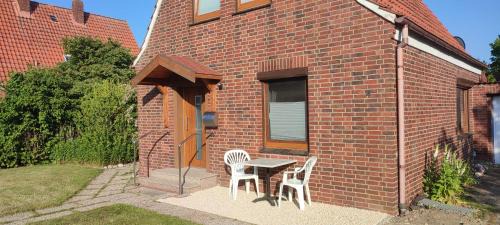 Otterndorf Casa | Nordseezimmer Koje - WLAN, Parkplatz, eigenes Bad, Fahrradschuppen, Rollladen
