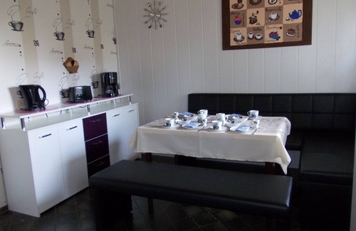 Nenndorf Apartamento | Vacaciones en el Mar del Norte en gran comodidad apartamento balcón silla de playa jardín parrilla