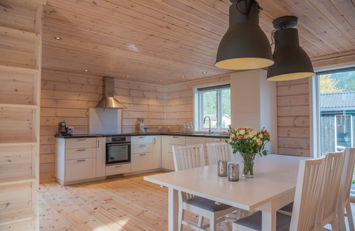 Kviteseid Villa | Casa de vacaciones de lujo en medio de la naturaleza y directamente en el lago Vravatn
