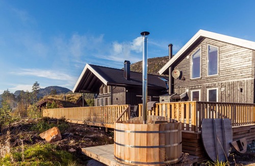 Kviteseid Villa | Casa de vacaciones de lujo en medio de la naturaleza y directamente en el lago Vravatn