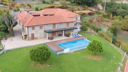 Pacos de Gaiolo Casa | O Beiral da Anastácia