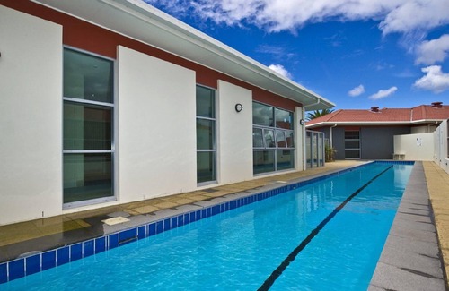 Salamander Bay Apartamento | 516 'Oaks Pacific Blue', 265 Sandy Point Road, piscina privada, aire acondicionado, WIFI