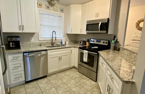 Colington Condominio | OBX Sunset Lovers ! 2 Bed/2 Bath Soundside Condo with Canal View