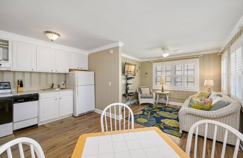 Midtown Ocean City Cabaña | Ocean block cottage nestled steps away from OC shoreline FREE LINENS