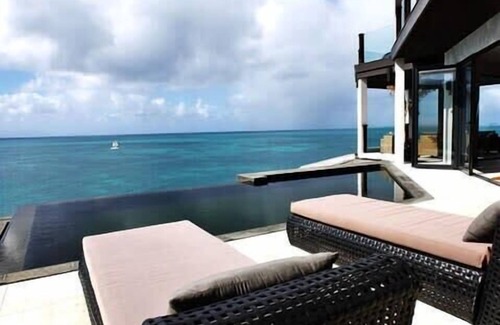 Fryes Beach Villa | Apartamento frente al mar moderno de tres habitaciones