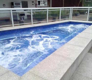 Pompeia Apartamento | OCEAN FRONT UNLIMITED COM VISTA MAR - Wi-FI, Piscina Borda infinita Aquecida de frente ao Mar, Jacuzzi, Saunas e Academia