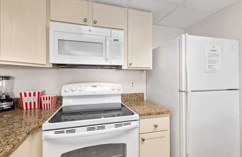 Caine Woods Condominio | Ocean Time Building - Unit #205