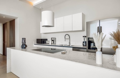 Flamingos Condominio | Ocean-view 5th-floor condo with 4 pools, sauna, steam room, huge balcony, & gym