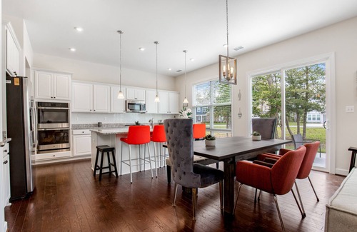 Frankford Casa | Ocean View Beach Club designer home with bikes, resort-style pool, sauna & gym