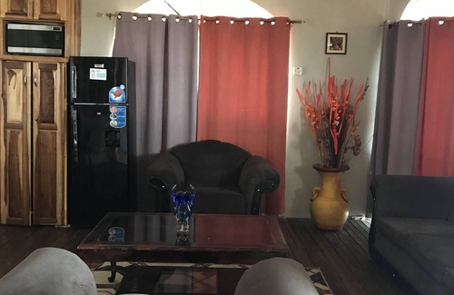 Montego Bay Cama Y Desayuno | Ocean view property 10 minutes away from the airport with roof top terrace.