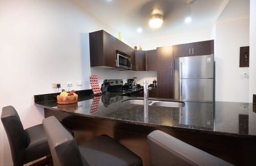 Barrio Los Villalobos Condominio | The Palms Ocean Club Resort