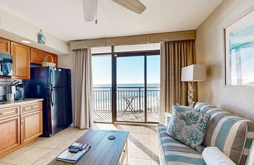 Windy Hill Condominio | Oceanfront condo with outdoor pool, hot tub, private balcony & central AC