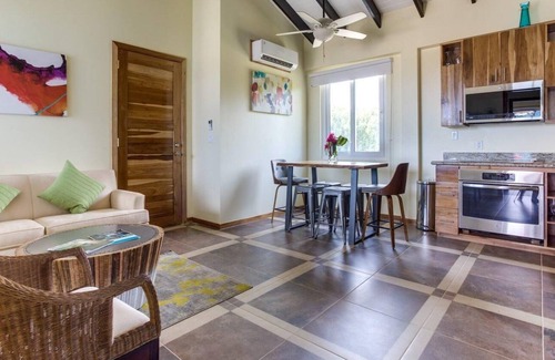 Placencia Complejo | Oceanfront Condo w/ Large Veranda & WiFi - Steps to Beach, Shops, & Dining
