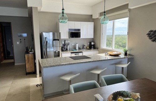 Cozumel Condominio | Precios especiales de noviembre y diciembre! Puestas de sol en el océano desde su enorme balcón privado.