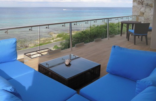 Cozumel Condominio | Precios especiales de noviembre y diciembre! Puestas de sol en el océano desde su enorme balcón privado.