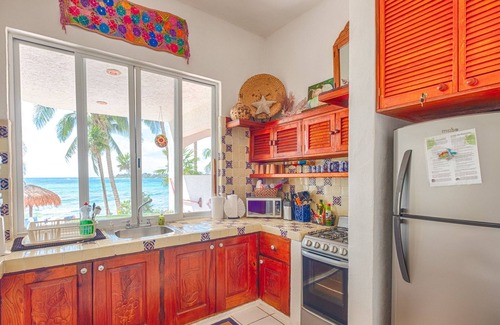 Akumal Condominio | Oceanfront Living with Direct Beach Access and Lush Poolside Gardens!
