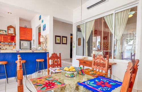 Akumal Condominio | Oceanfront Living with Direct Beach Access and Lush Poolside Gardens!