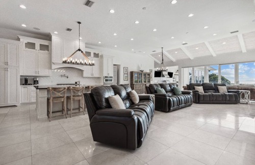 Fernandina Beach Casa | Oceanfront | Luxury Beachfront Home | Wall to Wall Folding Glass Doors Opening to Private Pool Deck