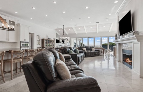 Fernandina Beach Casa | Oceanfront | Luxury Beachfront Home | Wall to Wall Folding Glass Doors Opening to Private Pool Deck