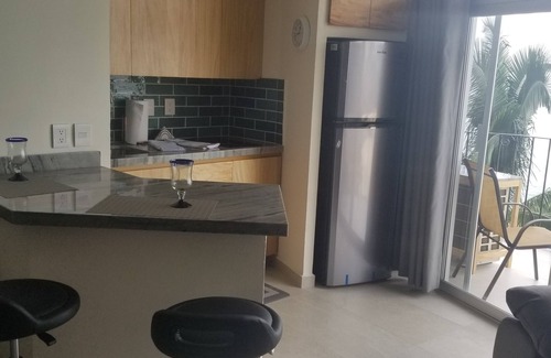South Shore Hotel Area Condominio | Oceanfront studio condo on Las Gemelas Beach Fully remodeled.