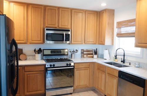 Kill Devil Hills Casa | Oceanside 4BR Home, Fenced Backyard, Hot Tub, 5 Min Walk to Beach!