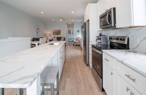 Wilmington Beach Condominio | First Pet Fee all Summer Long at Tide and Seek