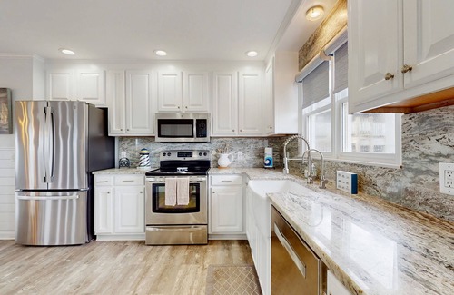 Holden Beach Casa | Oceanview home with hot tub, boat dock and direct canal access