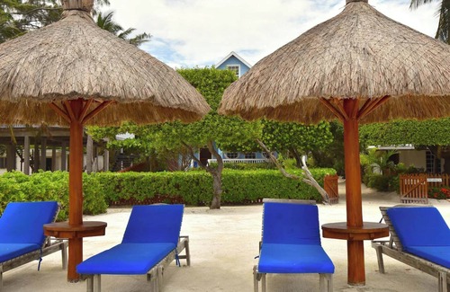Caye Caulker Apartamento | A pasos de la playa 3 habitaciones, 2 baños, casa con muelle de piscina privada, playa y aire acondicionado