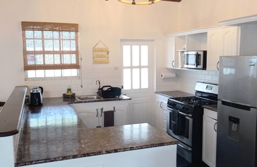 Scarborough Cabaña | Oistins Cottage - ¡Solo momentos de la playa!