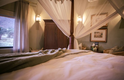 Windhoek Cabina | Okapuka Safari Lodge