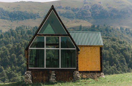 Kaputan Cabaña | OKON Highlands Cottages & Camp