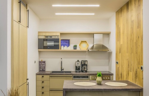Penteli Apartamento | Casita de Oleander. Un apartamento de 140 metros cuadrados de dos niveles.