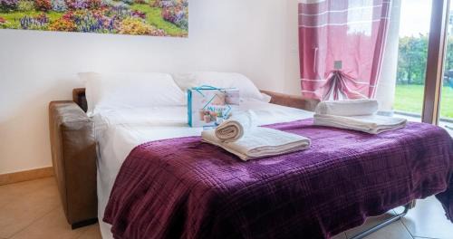 Rivoltella Apartamento | Oleandro Apartment - Featuring a Private Garden and Access to 5 Pools