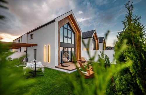 Rewal Casa | Olivina Park Spa - domki z dostępem do krytego basenu, saun, wyżywienia i atrakcji dla dzieci