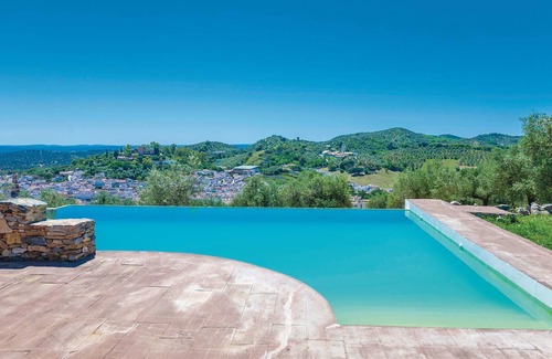 Constantina Casa | On a small hill in the mountains of Constantina, you will find this lovely vacation finca with a spe
