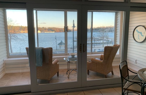 Charlevoix Condominio | On Round Lk in the Heart of Charlevoix w Garage. Walking Distance to Everything.