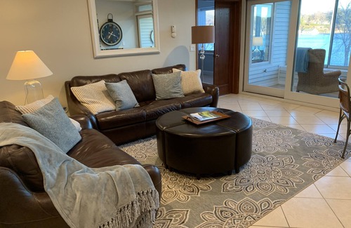 Charlevoix Condominio | On Round Lk in the Heart of Charlevoix w Garage. Walking Distance to Everything.