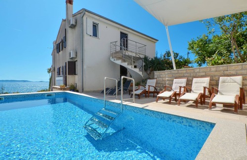 Seget Vranjica Apartamento | Apartamento de una habitación con terraza y vista al mar Seget Vranjica, Trogir (A-4284-b)