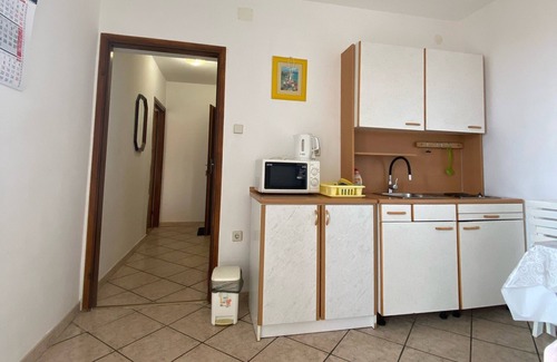 Lopar Apartamento | Apartamento de una habitación con balcón y vista al mar Lopar, Rab (A-23747-c)